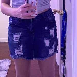 Denim skirt with rips